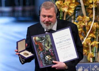 OSLO, NORWAY ñ DECEMBER 10, 2021: Dmitry Muratov, 2021 Nobel Peace Prize winner, Russian journalist, Novaya Gazeta editor-in-chief, is presented with diploma and gold medal at the 2021 Nobel Peace Prize award ceremony at the Oslo City Hall. The Norwegian Nobel Committee has decided to award the Nobel Peace Prize for 2021 to Maria Ressa and Dmitry Muratov in recognition of their efforts to safeguard freedom of expression, which is a precondition for democracy and lasting peace". Sergei Bobylev/TASS.No use Russia.