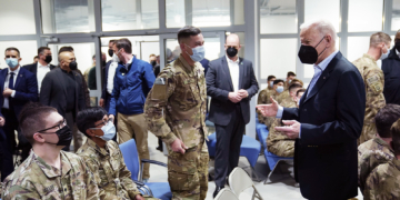 President Joe Biden visits with members of the 82nd Airborne Division at the G2A Arena, Friday, March 25, 2022, in Jasionka, Poland. (AP Photo/Evan Vucci)