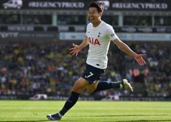 Tottenham Hotspur's South Korean striker Son Heung-Min celebrates after scoring a goal during the English Premier League football match between Norwich City and Tottenham Hotspur at Carrow Road Stadium in Norwich, eastern England, on May 22, 2022. - RESTRICTED TO EDITORIAL USE. No use with unauthorized audio, video, data, fixture lists, club/league logos or 'live' services. Online in-match use limited to 120 images. An additional 40 images may be used in extra time. No video emulation. Social media in-match use limited to 120 images. An additional 40 images may be used in extra time. No use in betting publications, games or single club/league/player publications. (Photo by Ben Stansall / AFP) / RESTRICTED TO EDITORIAL USE. No use with unauthorized audio, video, data, fixture lists, club/league logos or 'live' services. Online in-match use limited to 120 images. An additional 40 images may be used in extra time. No video emulation. Social media in-match use limited to 120 images. An additional 40 images may be used in extra time. No use in betting publications, games or single club/league/player publications. / RESTRICTED TO EDITORIAL USE. No use with unauthorized audio, video, data, fixture lists, club/league logos or 'live' services. Online in-match use limited to 120 images. An additional 40 images may be used in extra time. No video emulation. Social media in-match use limited to 120 images. An additional 40 images may be used in extra time. No use in betting publications, games or single club/league/player publications. (Photo by BEN STANSALL/AFP via Getty Images)